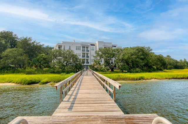 dock area featuring a water view