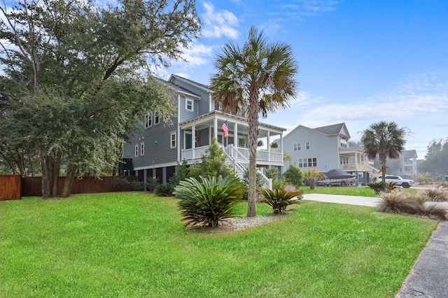 view of yard with a sunroom