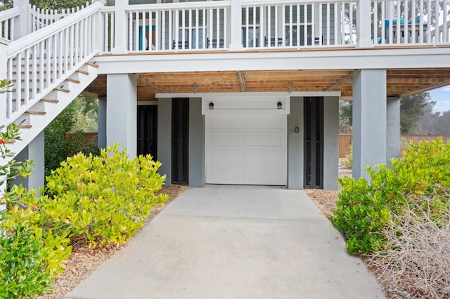 doorway to property with a garage