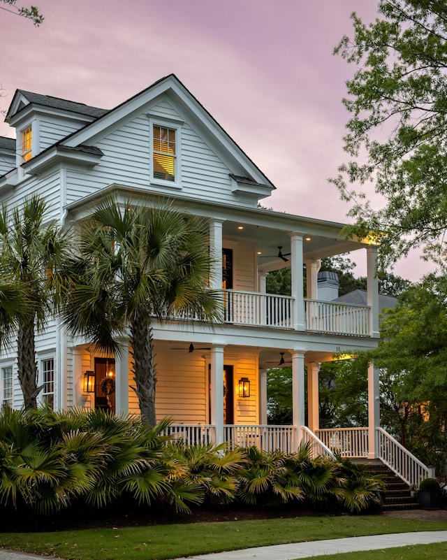 11 Dalton St, Daniel Island, SC 29492 - view of front of home with a balcony, a porch, and ceiling fan