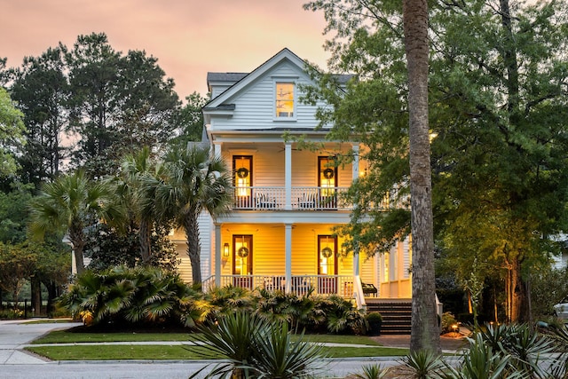 11 Dalton St, Daniel Island, SC 29492 - view of front of property with a porch and a balcony