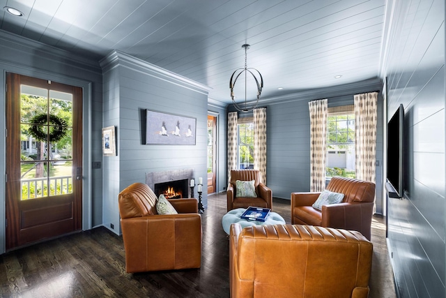 11 Dalton St, Daniel Island, SC 29492 - living area featuring a fireplace, dark wood-style flooring, crown molding, recessed lighting, and wood walls