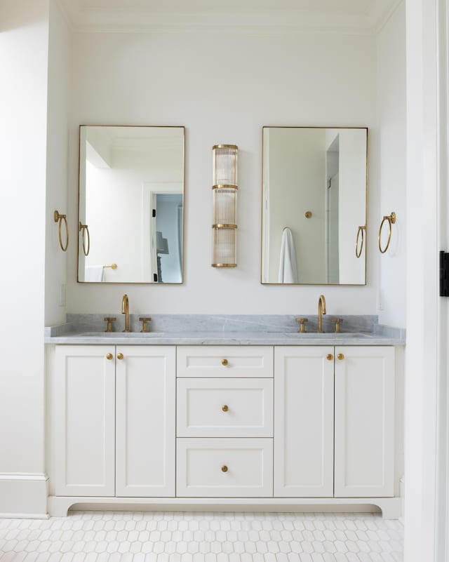 11 Dalton St, Daniel Island, SC 29492 - bathroom featuring ornamental molding and double vanity