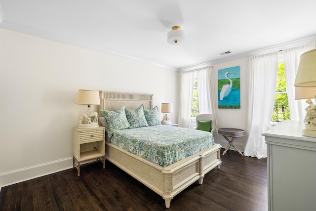 11 Dalton St, Daniel Island, SC 29492 - bedroom featuring dark wood-type flooring, multiple windows, baseboards, and ornamental molding