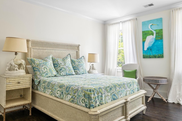 11 Dalton St, Daniel Island, SC 29492 - bedroom with ornamental molding, wood finished floors, and baseboards