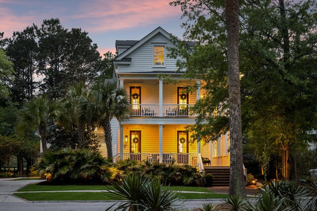 11 Dalton St, Daniel Island, SC 29492 - view of front of house with covered porch, a balcony, and stairs