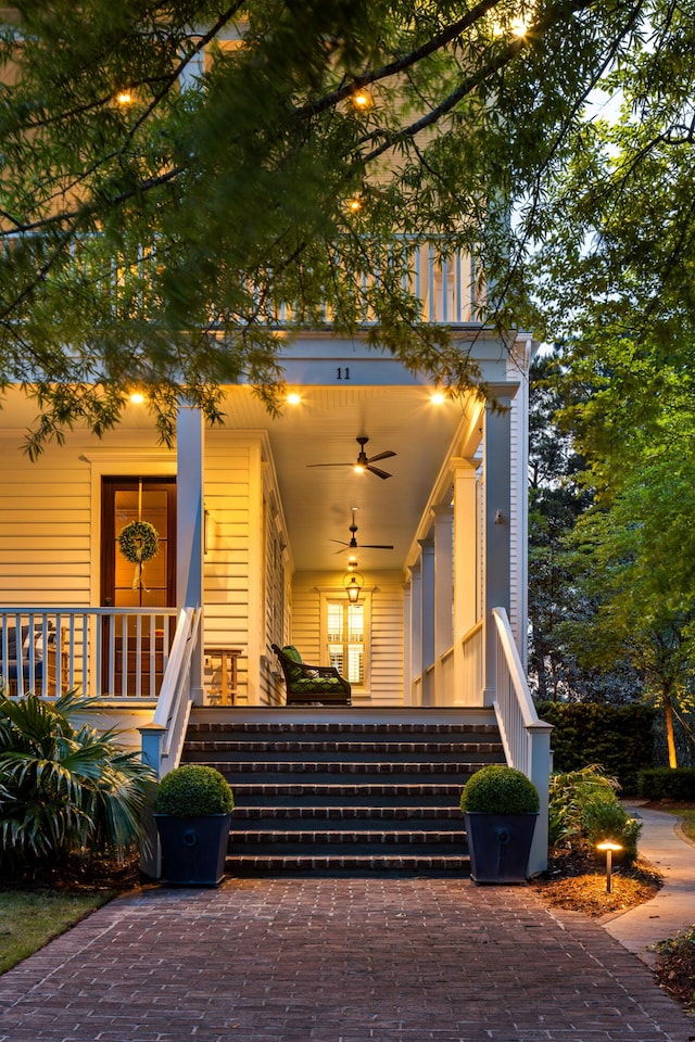 11 Dalton St, Daniel Island, SC 29492 - view of front of property with ceiling fan and covered porch