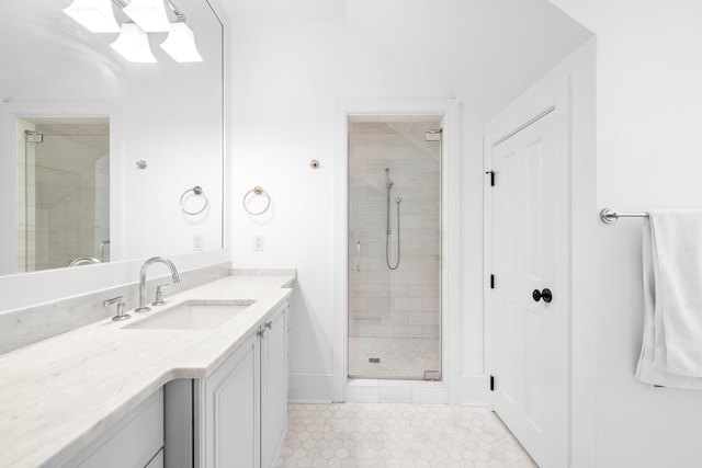 11 Dalton St, Daniel Island, SC 29492 - bathroom featuring a stall shower, vanity, tile patterned floors, and vaulted ceiling