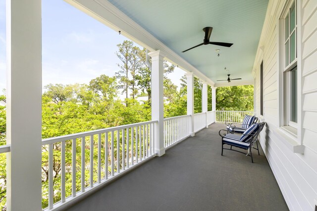 11 Dalton St, Daniel Island, SC 29492 - balcony with a ceiling fan and a porch