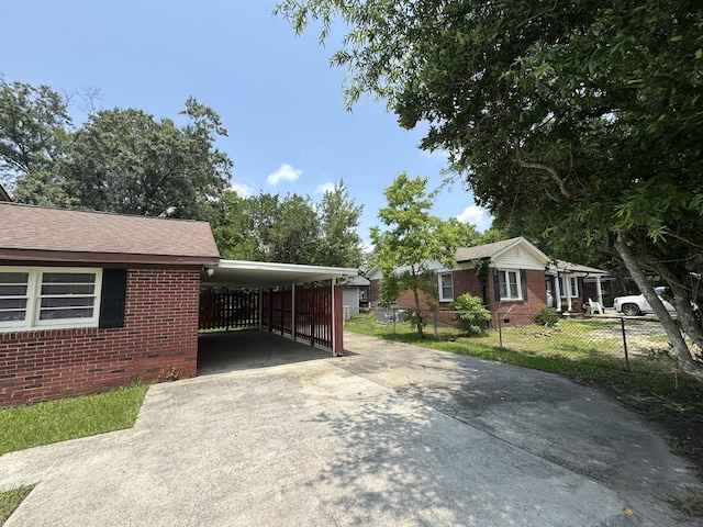 36 Guerry Cir, Goose Creek, SC 29445 - view of home's exterior featuring brick siding, concrete driveway, and an attached carport