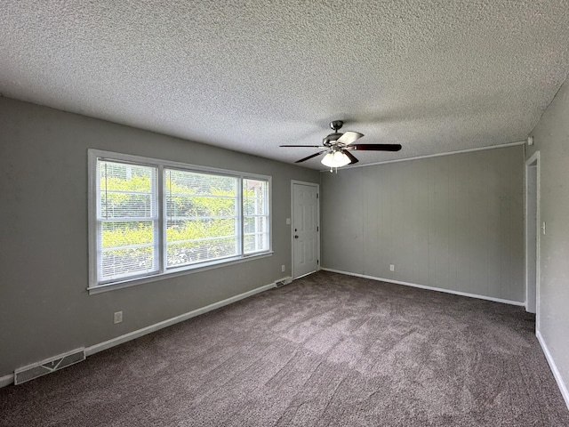 36 Guerry Cir, Goose Creek, SC 29445 - carpeted empty room with ceiling fan, a textured ceiling, and baseboards