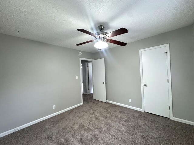 36 Guerry Cir, Goose Creek, SC 29445 - unfurnished bedroom with carpet, baseboards, a textured ceiling, and ceiling fan