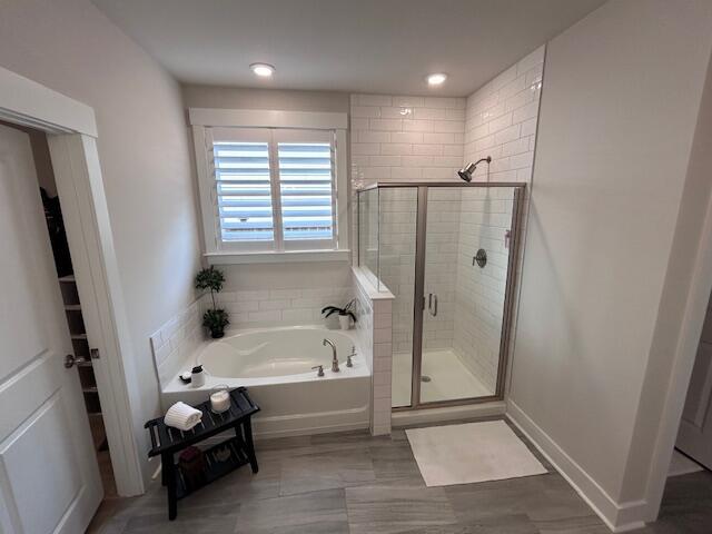 bathroom with plus walk in shower