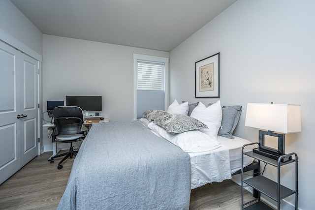 bedroom featuring hardwood / wood-style floors
