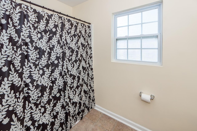 bathroom with baseboards