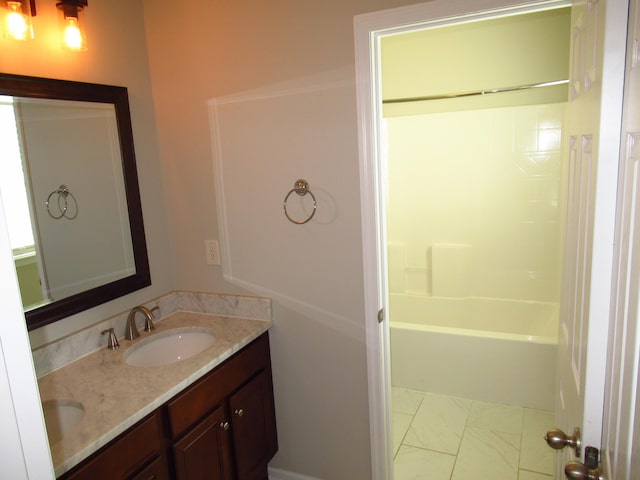 bathroom featuring vanity and bathtub / shower combination