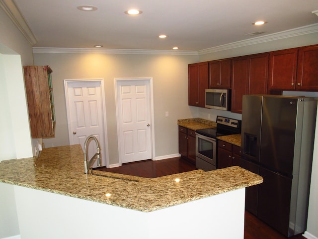 kitchen featuring appliances with stainless steel finishes, ornamental molding, dark hardwood / wood-style flooring, and light stone counters