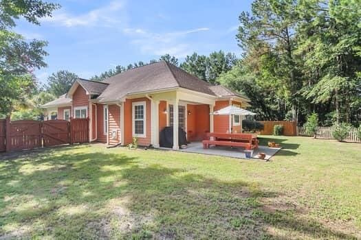 350 Cypress Walk Way, Wando, SC 29492 - back of property with a fenced backyard, a patio, and a gate