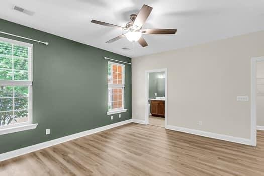 350 Cypress Walk Way, Wando, SC 29492 - empty room featuring ceiling fan, healthy amount of natural light, and wood finished floors