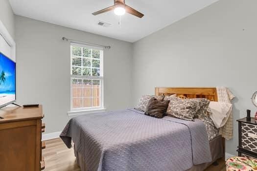 350 Cypress Walk Way, Wando, SC 29492 - bedroom featuring light wood-style flooring and a ceiling fan