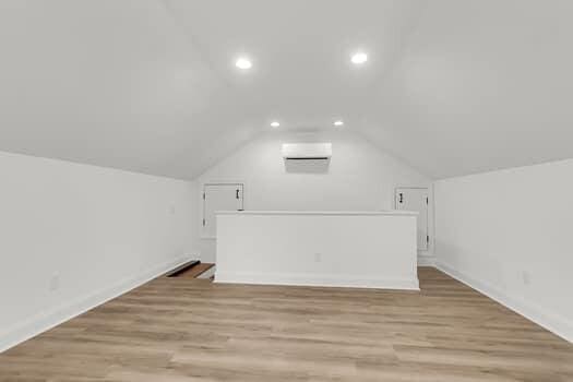 350 Cypress Walk Way, Wando, SC 29492 - bonus room featuring lofted ceiling, recessed lighting, and light wood-style flooring
