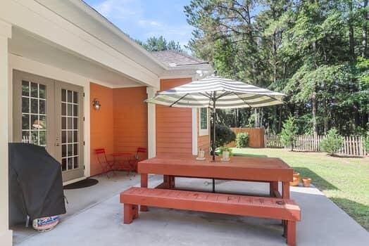 350 Cypress Walk Way, Wando, SC 29492 - view of patio / terrace featuring french doors and outdoor dining area