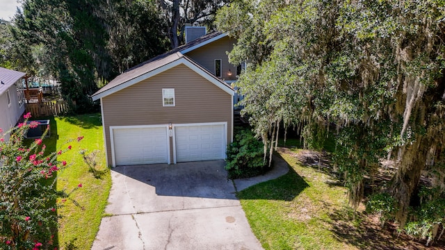 garage with a lawn