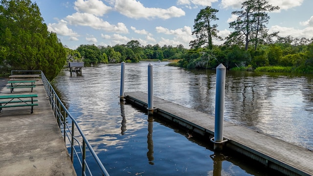 view of dock with a water view