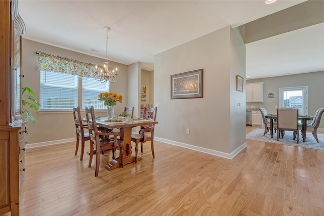 109 Cypress Plantation Rd, Moncks Corner, SC 29461 - dining area with a chandelier and light wood-style flooring
