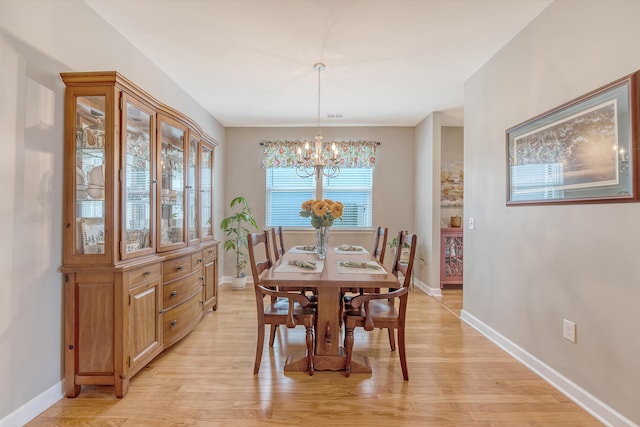 109 Cypress Plantation Rd, Moncks Corner, SC 29461 - dining area featuring a chandelier and light wood-type flooring