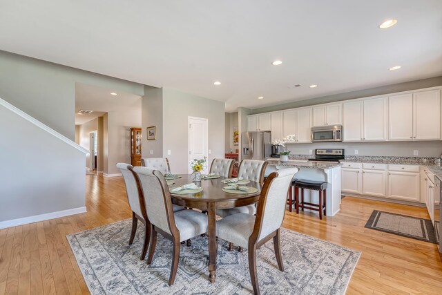109 Cypress Plantation Rd, Moncks Corner, SC 29461 - dining area with light wood finished floors and recessed lighting