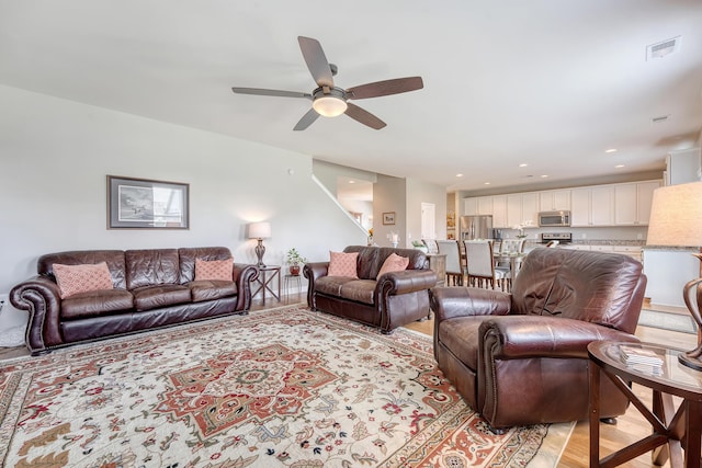 109 Cypress Plantation Rd, Moncks Corner, SC 29461 - living area with ceiling fan, light wood-style flooring, recessed lighting, and stairway