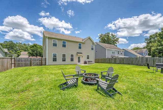 109 Cypress Plantation Rd, Moncks Corner, SC 29461 - rear view of house with a fire pit and a fenced backyard