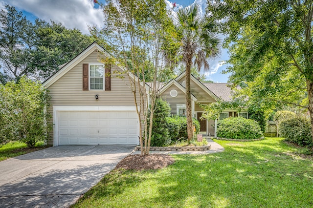 front facade with a garage and a front yard