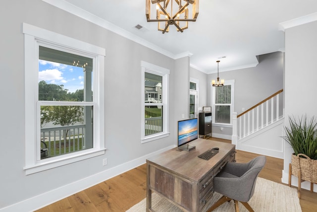 home office with wood-type flooring, a chandelier, and crown molding