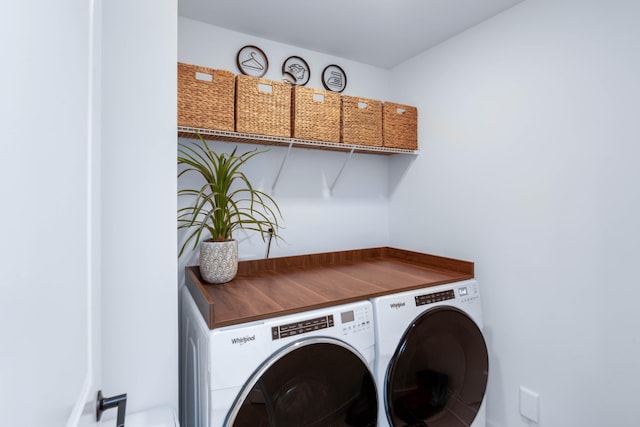 washroom featuring washer and dryer