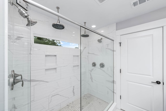 bathroom with an enclosed shower