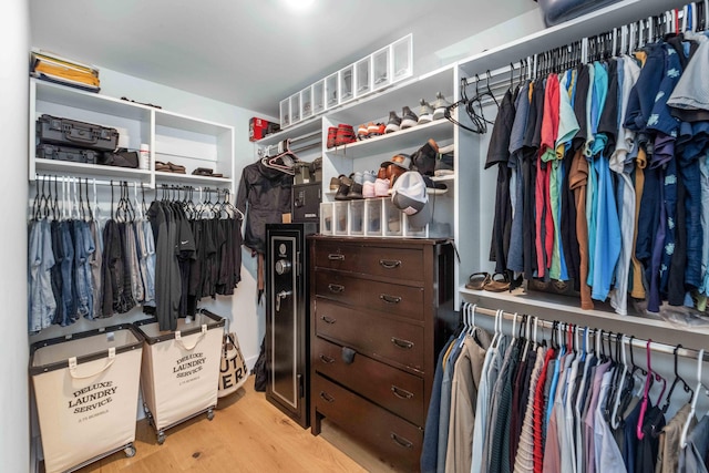 spacious closet featuring light wood-type flooring