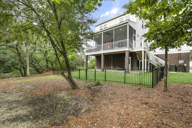 back of property featuring a sunroom