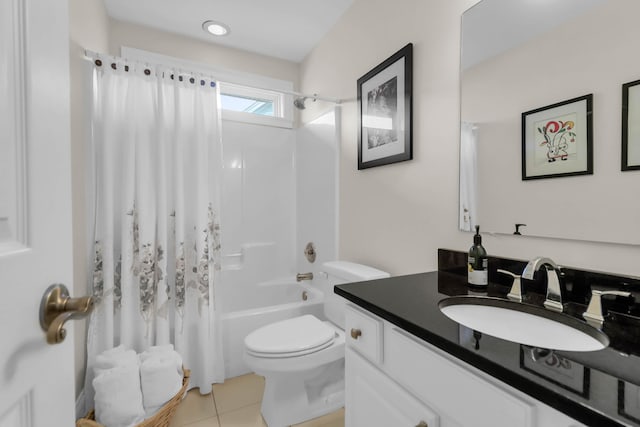 full bathroom with shower / bath combination with curtain, vanity, tile patterned flooring, and toilet