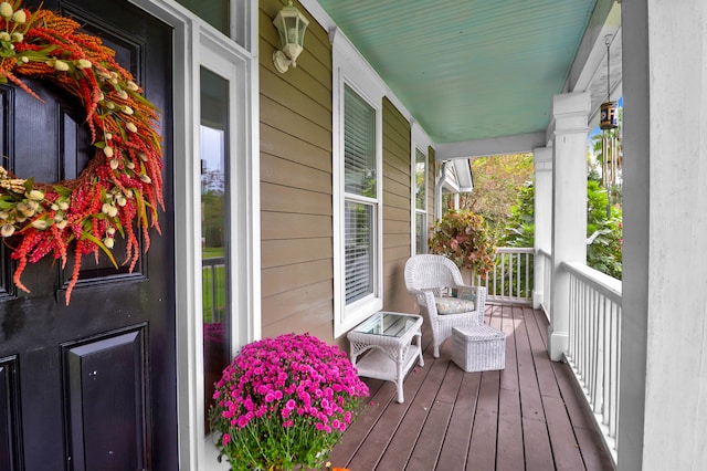 wooden deck featuring a porch