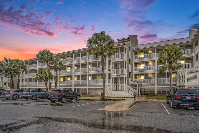 view of outdoor building at dusk