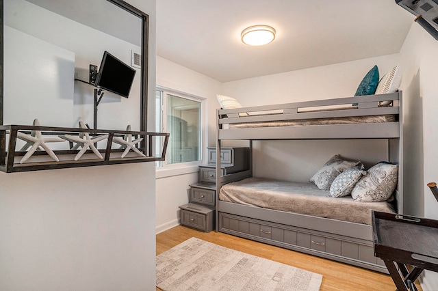 bedroom featuring light wood-type flooring