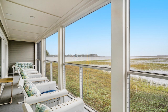 sunroom / solarium with a rural view