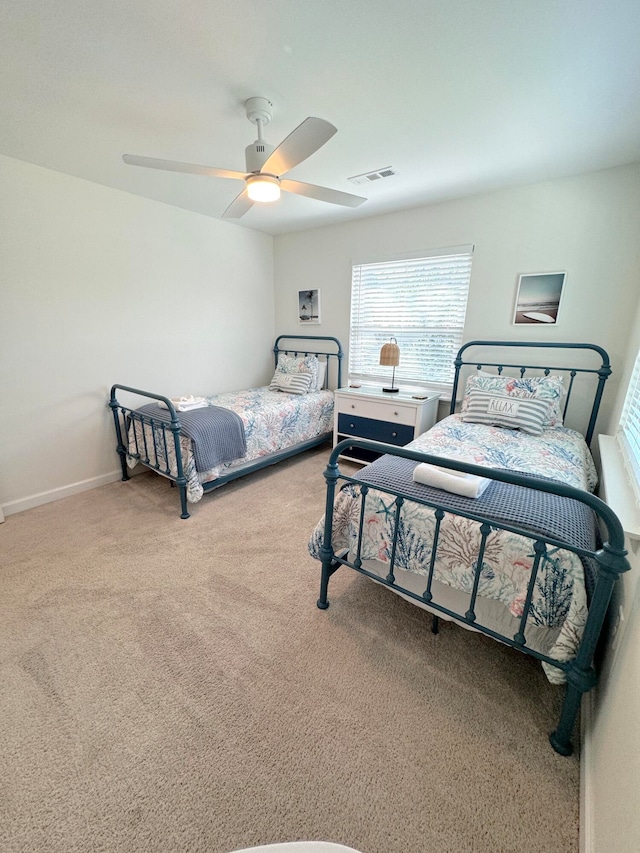 bedroom with carpet and ceiling fan