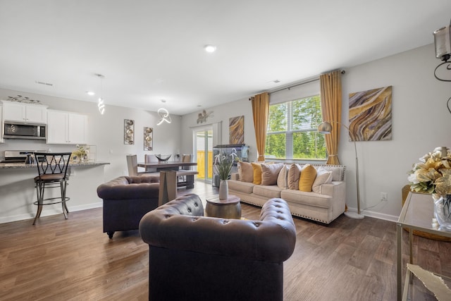 225 N Light Way, Summerville, SC 29486 - living room featuring wood finished floors and baseboards