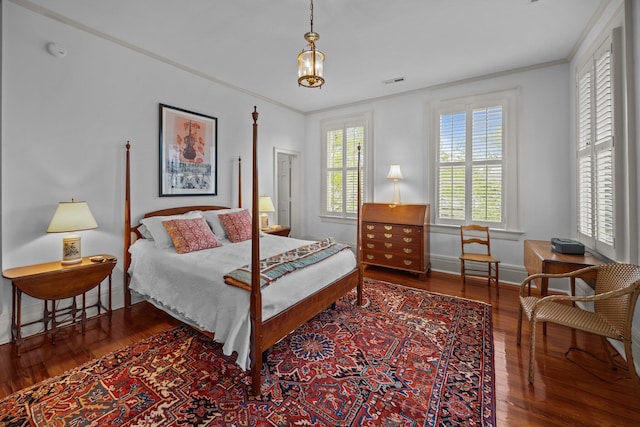 41 Legare St Unit C, Charleston, SC 29401 - bedroom with wood finished floors, baseboards, and ornamental molding