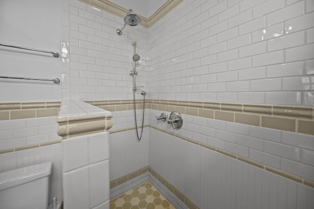 41 Legare St Unit C, Charleston, SC 29401 - full bathroom featuring tile walls, a tile shower, and toilet