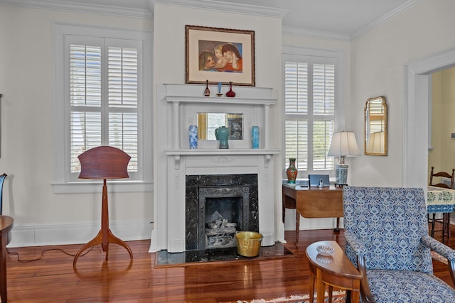 41 Legare St Unit C, Charleston, SC 29401 - sitting room featuring wood finished floors, a fireplace, crown molding, and baseboards