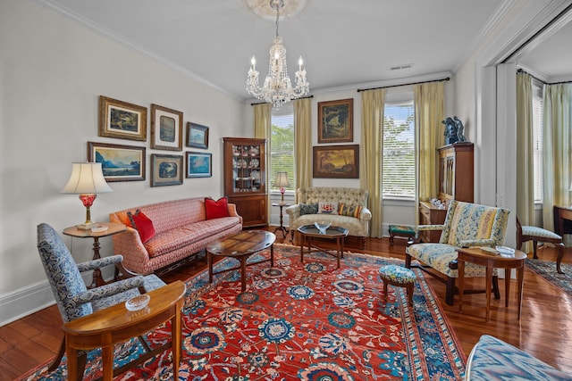 41 Legare St Unit C, Charleston, SC 29401 - living room with crown molding, wood finished floors, a chandelier, and baseboards